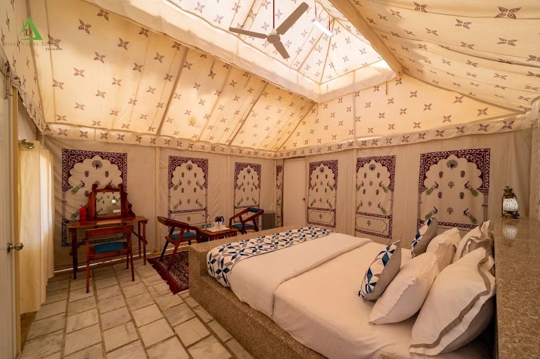 5-Star Desert Camp — Decorative tent interiors, room photographs and bathroom details.
