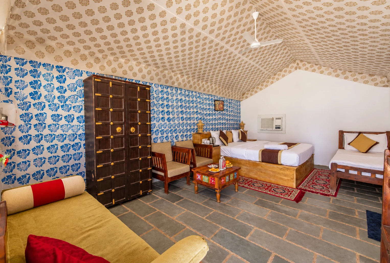 4-Star Desert Camp — Tent interiors, lounge seating and a dining space from the camp collection.